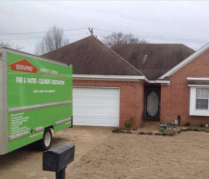SERVPRO truck in front of house