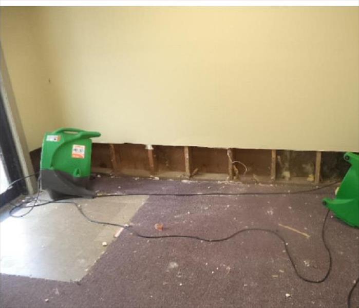 SERVPRO equipment with drywall cut