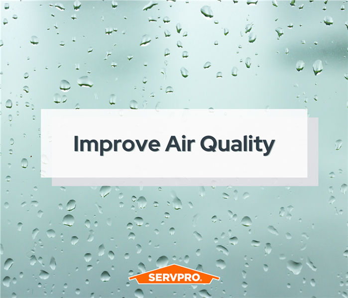 words "improve air quality" across a humid water droplet picture, servpro logo in bottom